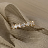 Single Diamond & Baguette Wedding Band