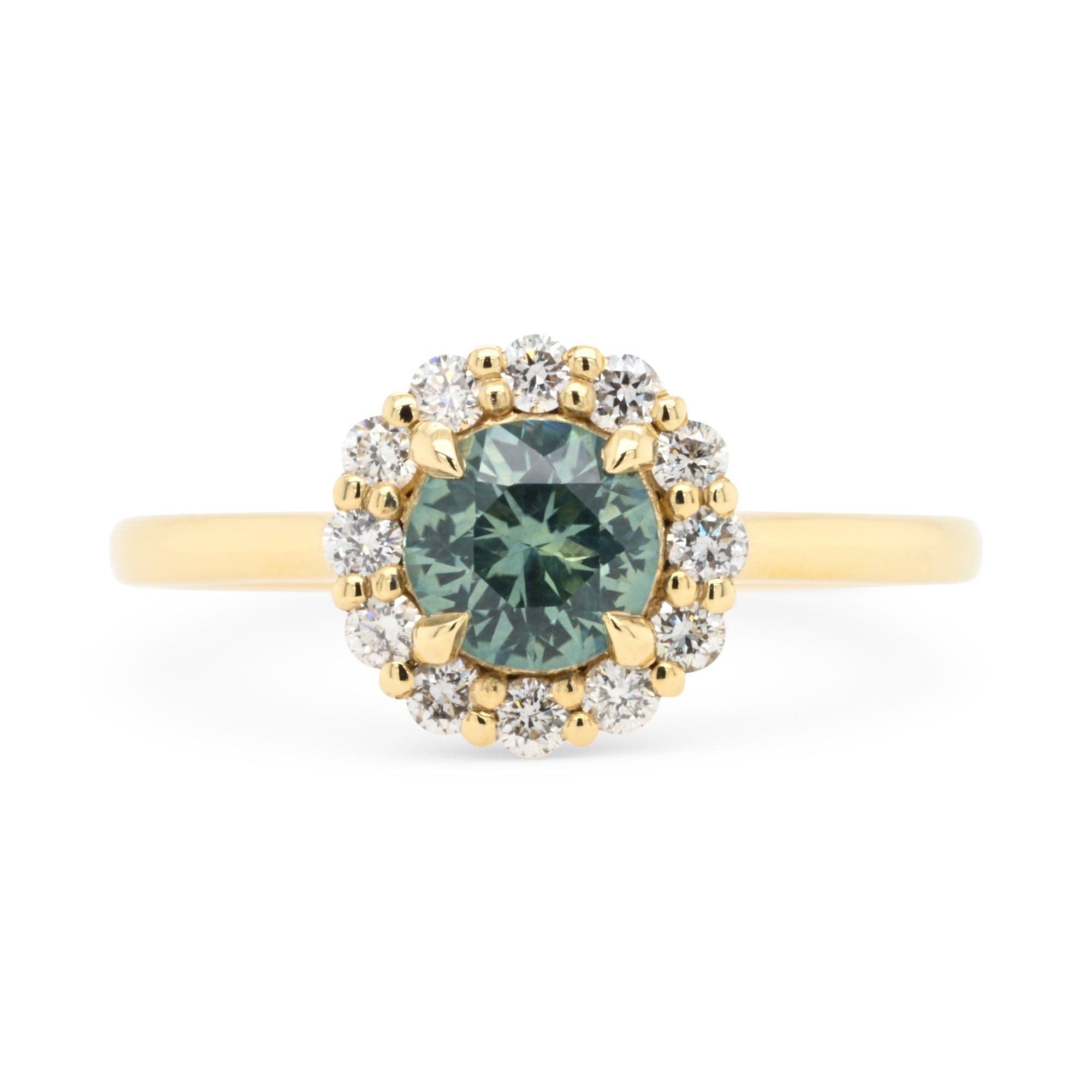 14k yellow gold diamond halo and blue montana sapphire engagement ring