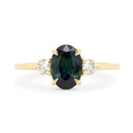 14k yellow gold engagement ring with teal green oval sapphire and diamonds