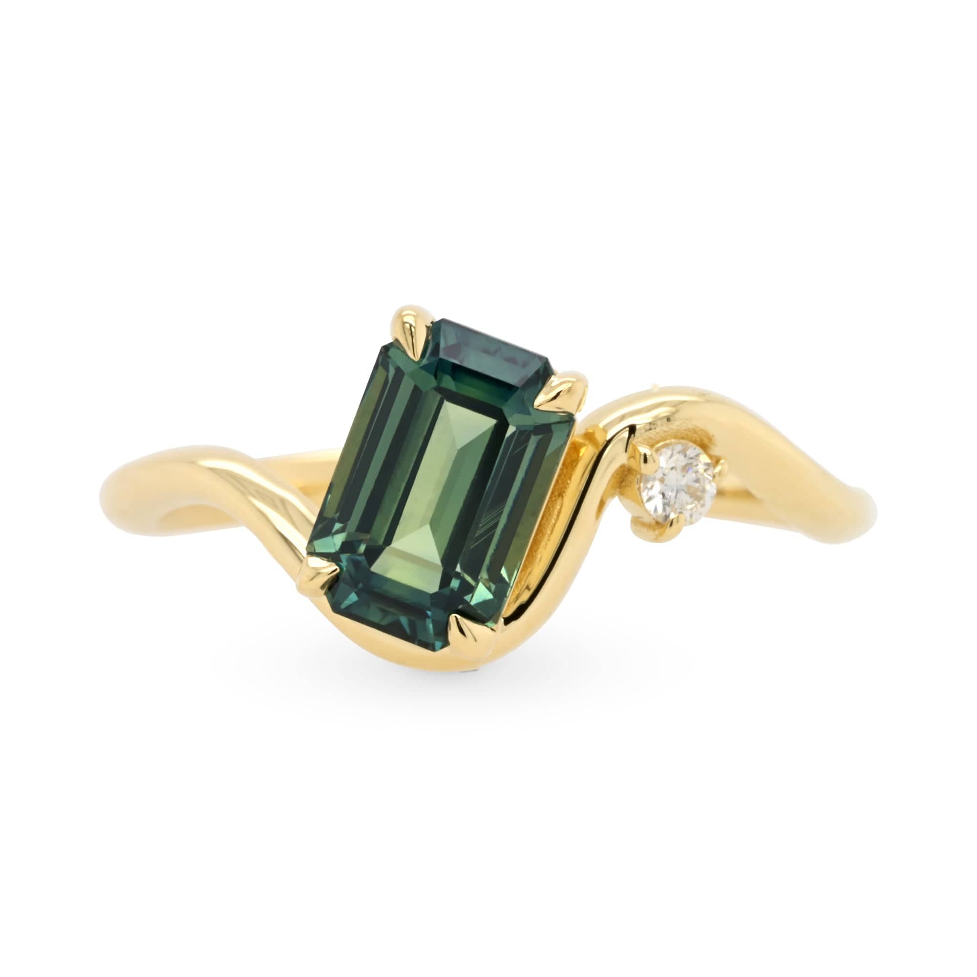 Sculptural 14k yellow gold emerald cut teal sapphire and white diamond engagement ring