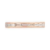 Channel set baguette diamond wedding band in rose gold