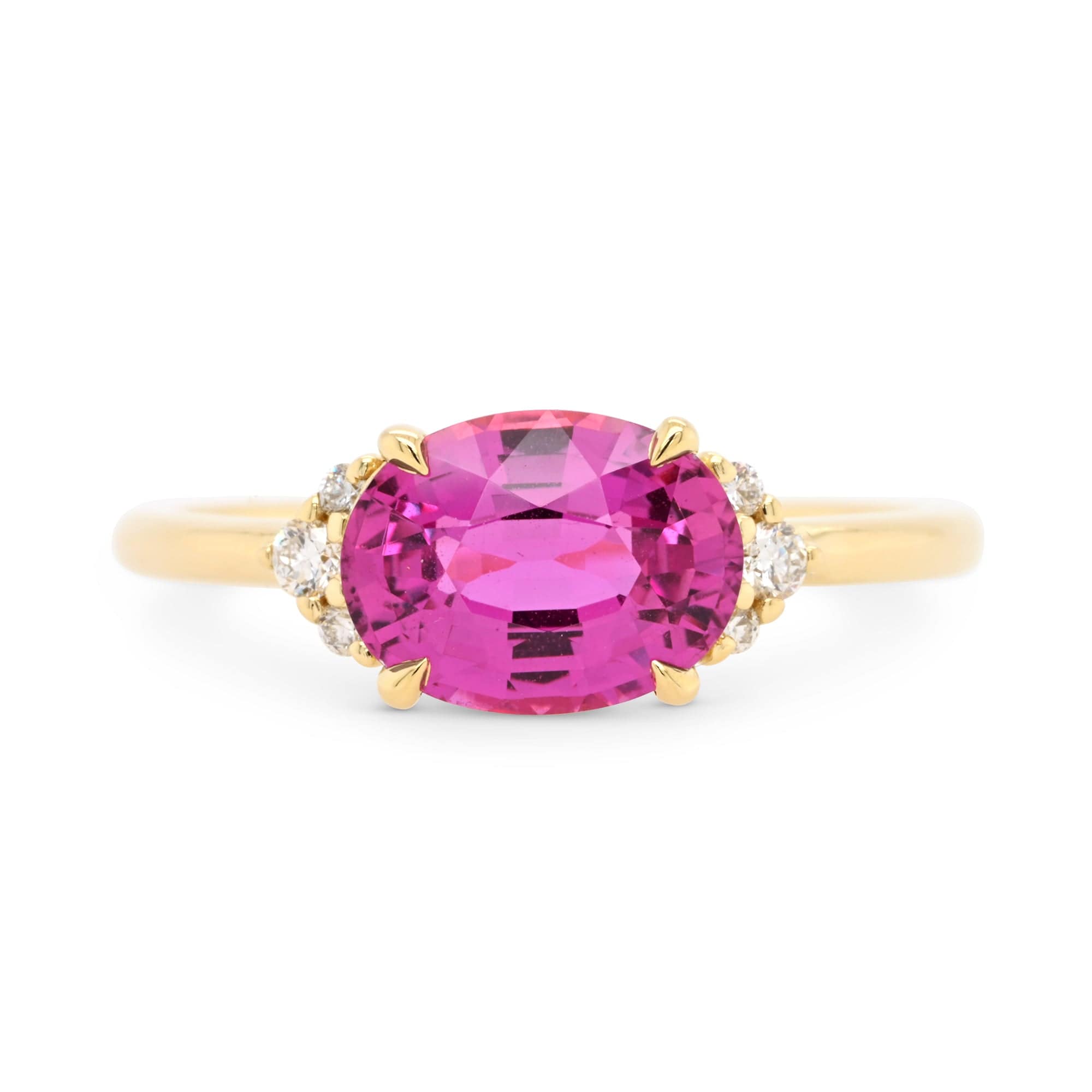 14k yellow gold engagement ring with pink oval-cut sapphire and diamonds