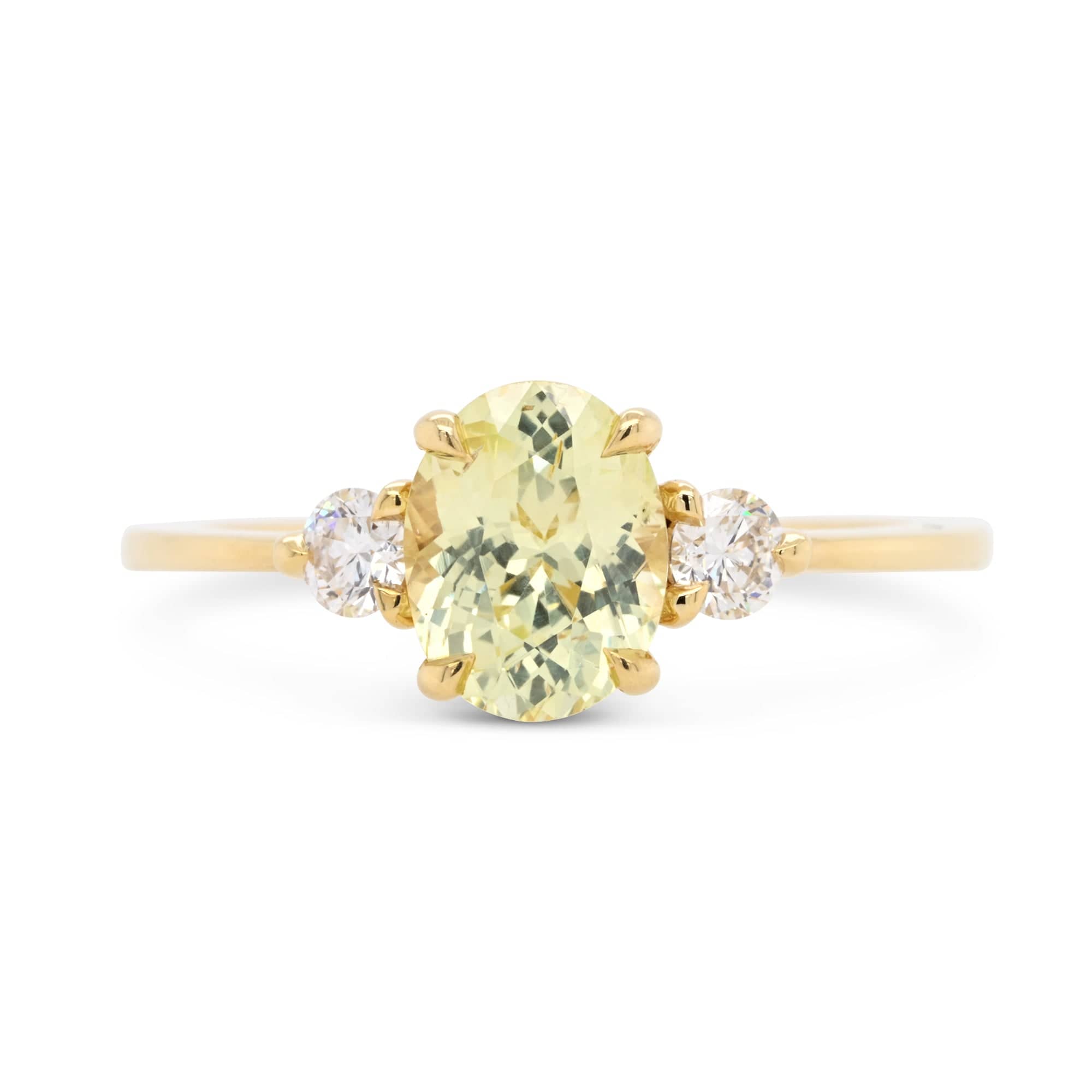 14k yellow gold engagement ring with yellow oval-cut sapphire and diamonds