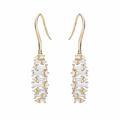 baguette earrings alternating as they dangle from north to south